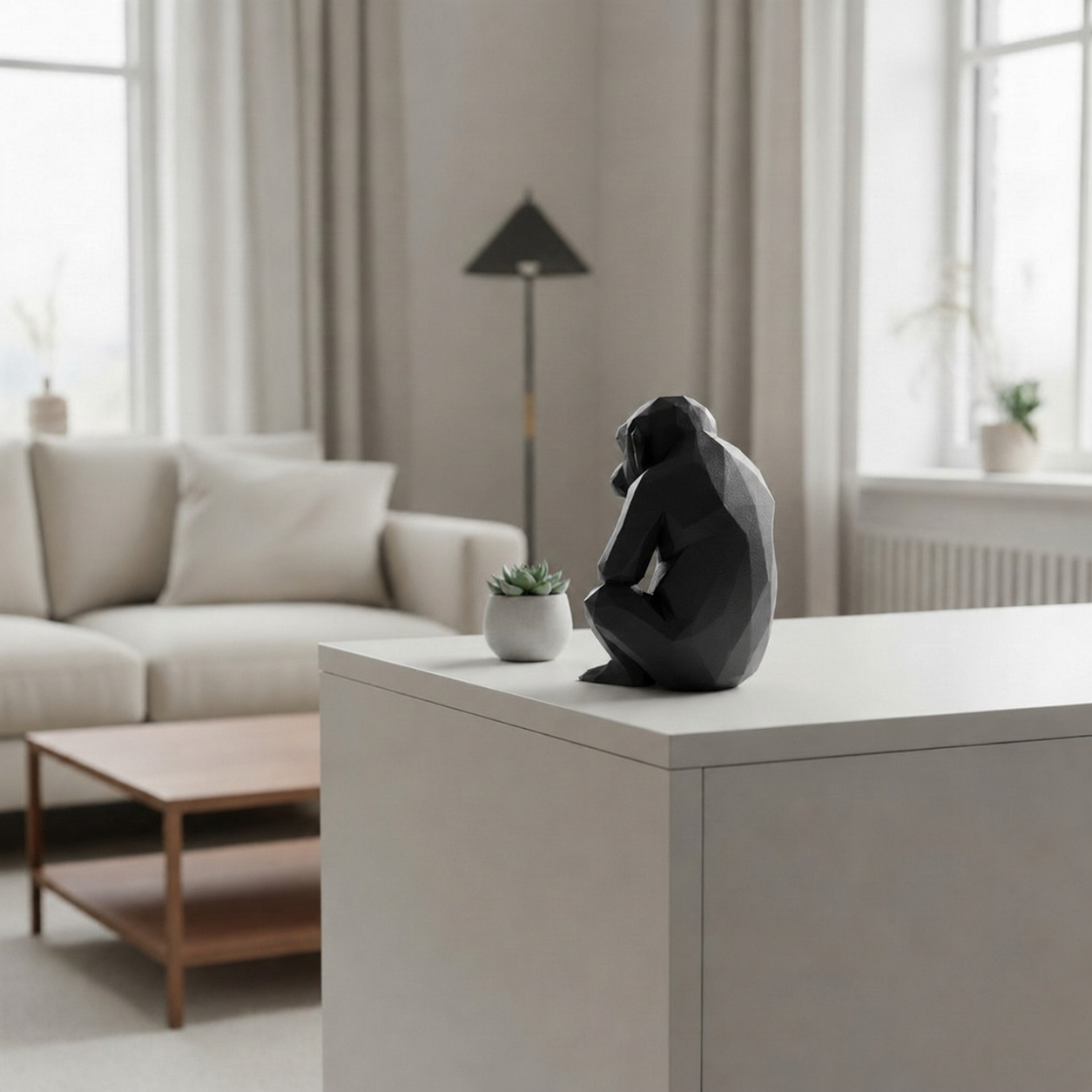 Geometrisk abe figur i mat sort